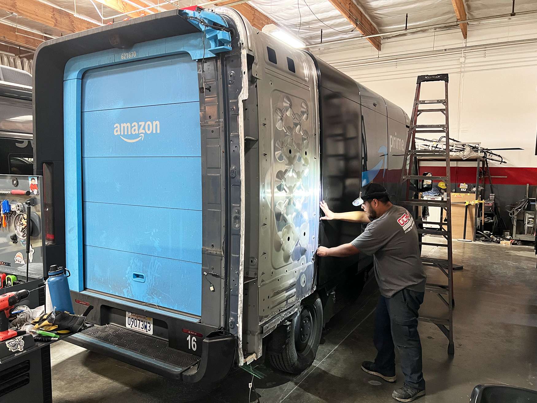 Rivian body damage repair on side panels
